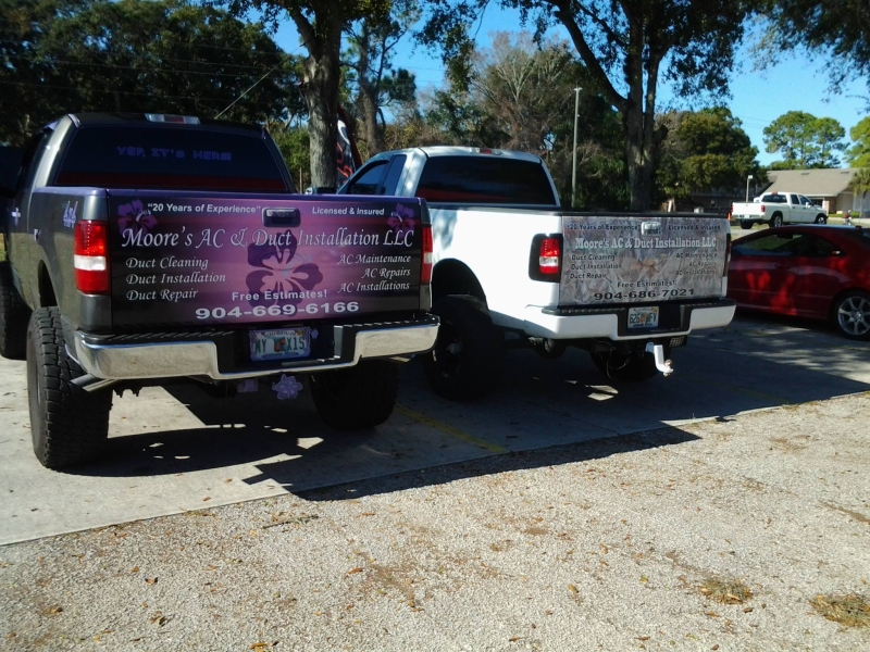 moore's ac & duct installation tailgate wraps